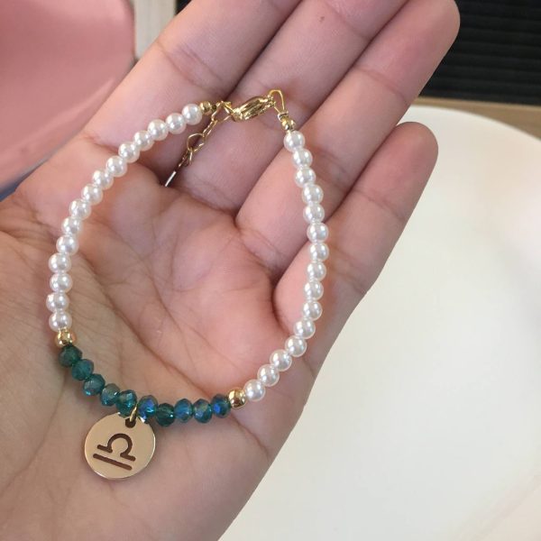 Pulsera de Perlas con Dije de Signo Zodiacal Libra
