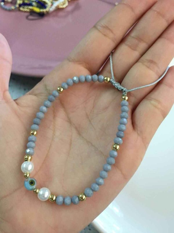 Pulsera de Cristales Grises con Ojo Turco y Perlas